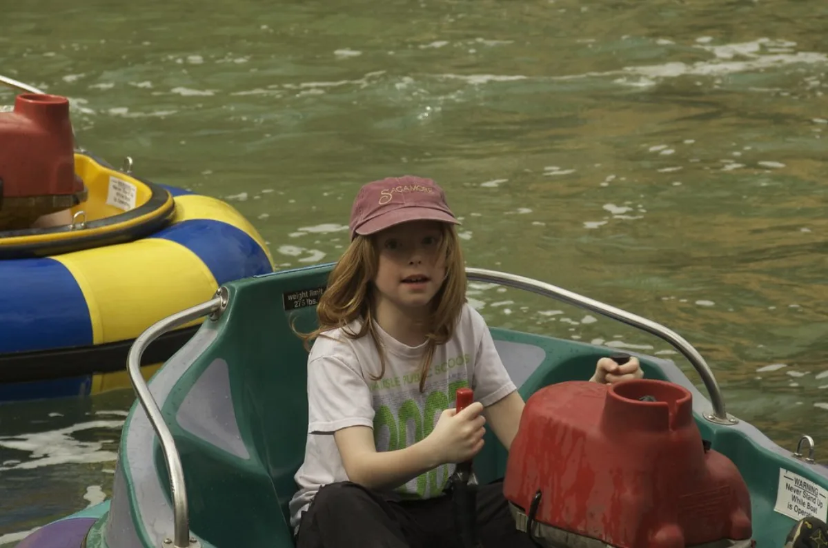 A child steering a bumper boat (file photo, not taken at Fiesta Fun)