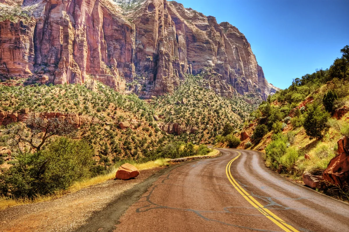 Red sandstone cliffs of Zion National Park above the canyon floor near Springdale, Utah