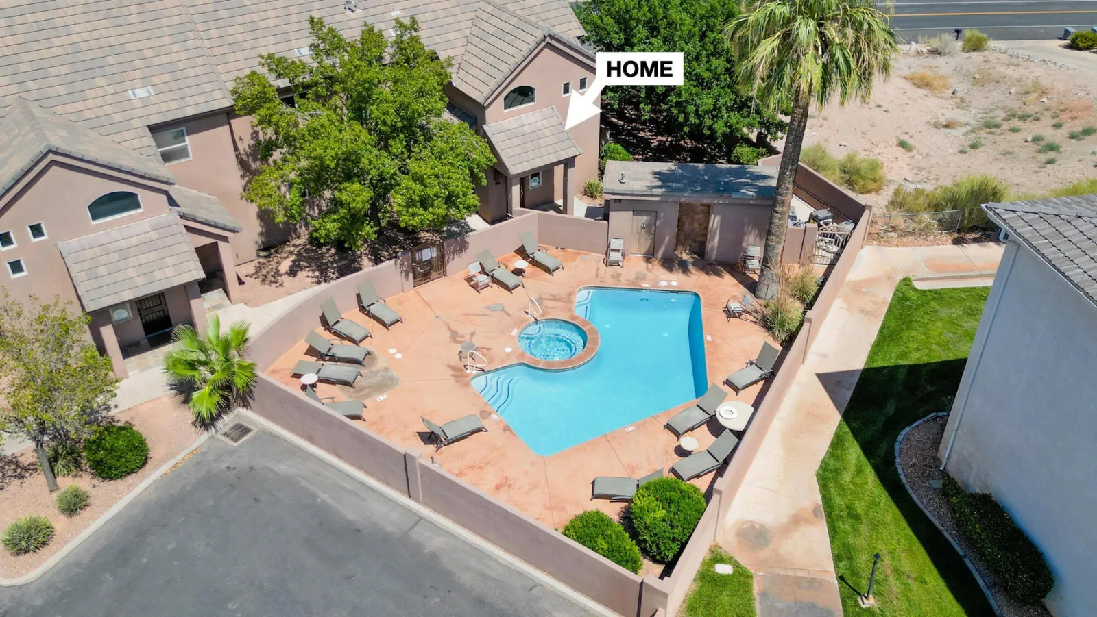 Aerial view of the community pool and hot tub at the St. George condominium